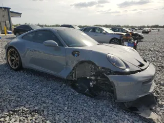 2024 Porsche 911 GT3 with VIN WP0AC2A90RS263286, listed as a Copart auction lot 51160205 with 5,735 mi miles and Salvage Title. Bid and sale history available at carsss.com. Image 4.