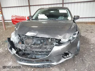 2014 Mazda Mazda3 i Touring with VIN 3MZBM1L75EM109082, listed as a IAAI auction lot 41625740 with 123,618 mi miles. Bid and sale history available at carsss.com. Image 6.