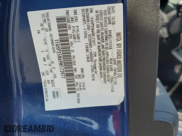 2009 Ford Focus SE with VIN 1FAHP35N69W173977, listed as a Copart auction lot 69018554 with 138,496 mi miles and Salvage Title. Bid and sale history available at DreamBid. Image 12.