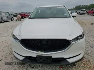 2020 Mazda CX-5 Touring z VIN JM3KFACM6L0787687, wystawiony jako Copart lot #57639555 z przebiegiem 91 219 mil mil oraz Szkoda całkowita • Salvage title. Historia ofert i sprzedaży dostępna na DreamBid. Obrazek 14.
