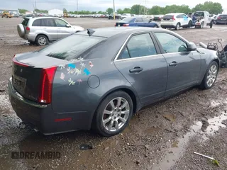 2009 Cadillac CTS AWD z VIN 1G6DT57V790133622, wystawiony jako IAAI lot #42272929 z przebiegiem 124 695 mil mil oraz . Historia ofert i sprzedaży dostępna na DreamBid. Obrazek 4.