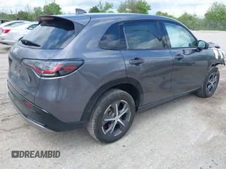 2023 Honda HR-V EX-L with VIN 3CZRZ1H77PM724631, listed as a IAAI auction lot 42453591 with 28,758 mi miles and . Bid and sale history available at DreamBid. Image 4.