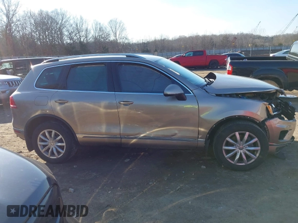2016 Volkswagen Touareg Sport with VIN WVGEF9BP0GD003241, listed as a IAAI auction lot 41498797 with 90,141 mi miles and . Bid and sale history available at DreamBid. Image 13.