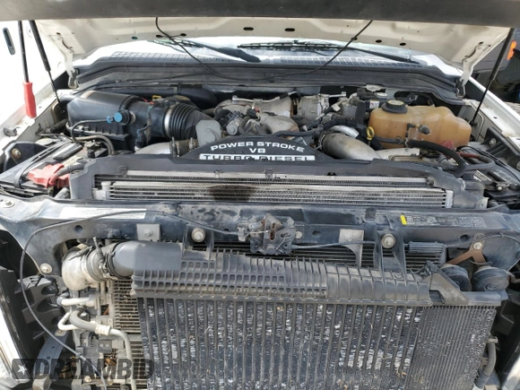 2008 Ford F-350 XL z VIN 1FTWW31R78EA62095, wystawiony jako Copart lot #56411635 z przebiegiem 107 404 mil mil oraz Szkoda całkowita • Salvage title. Historia ofert i sprzedaży dostępna na DreamBid. Obrazek 11.