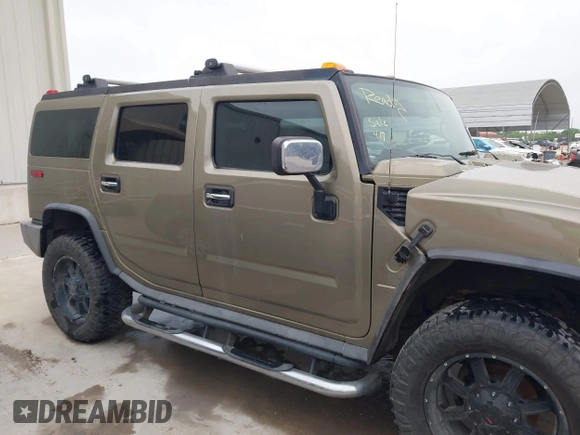 2005 Hummer H2 SUV z VIN 5GRGN23U95H132238, wystawiony jako IAAI lot #41809909 z przebiegiem 300 293 mil mil oraz . Historia ofert i sprzedaży dostępna na DreamBid. Obrazek 13.
