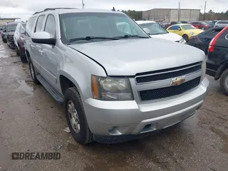 2011 Chevrolet Suburban LS with VIN 1GNSCHE06BR188407, listed as a IAAI auction lot 41453215 with 232,667 mi miles. Bid and sale history available at carsss.com. Image 1.
