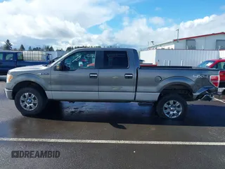 2011 Ford F-150 XL with VIN 1FTFW1EF1BFB58262, listed as a IAAI auction lot 41788963 with 157,328 mi miles. Bid and sale history available at carsss.com. Image 14.