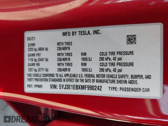 2021 Tesla Model 3 Long Range with VIN 5YJ3E1EBXMF990242, listed as a IAAI auction lot 41674222 with 24,554 mi miles and . Bid and sale history available at DreamBid. Image 9.