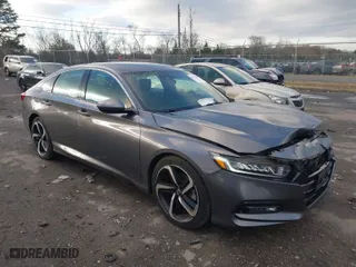 2018 Honda Accord Sedan Sport 1.5T with VIN 1HGCV1F38JA168231, listed as a IAAI auction lot 41152093 with 141,061 mi miles. Bid and sale history available at carsss.com. Image 1.