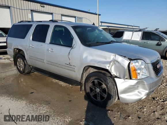 2014 GMC Yukon XL SLT with VIN 1GKS2KE75ER199316, listed as a Copart auction lot 50145985 with 245,746 mi miles and Salvage Title. Bid and sale history available at carsss.com. Image 4.