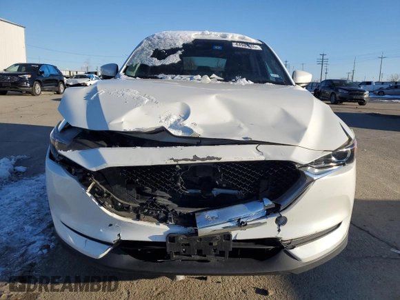 2021 Mazda CX-5 Touring with VIN JM3KFBCM9M0336910, listed as a Copart auction lot 48032275 with 65,515 mi miles and Salvage Title. Bid and sale history available at carsss.com. Image 5.