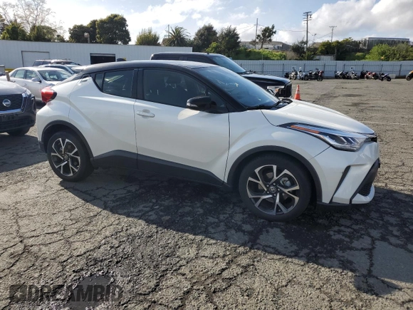 2020 Toyota C-HR LE with VIN JTNKHMBX7L1077252, listed as a Copart auction lot 51486305 with 64,213 mi miles and Salvage Title. Bid and sale history available at DreamBid. Image 4.