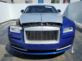 2015 Rolls-Royce Wraith z VIN SCA665C55FUX85086, wystawiony jako Copart lot #48961135 z przebiegiem 31 124 mil mil oraz Szkody całkowita. Historia ofert i sprzedaży dostępna na DreamBid. Obrazek 5.