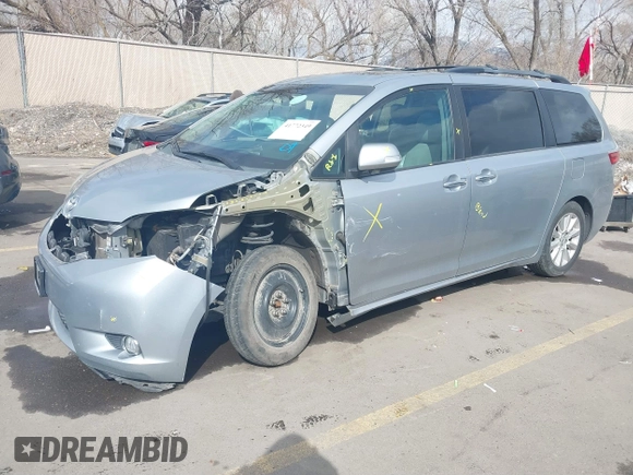 2015 Toyota Sienna XLE with VIN 5TDYK3DC2FS640204, listed as a IAAI auction lot 41772349 with 104,156 mi miles. Bid and sale history available at carsss.com. Image 18.