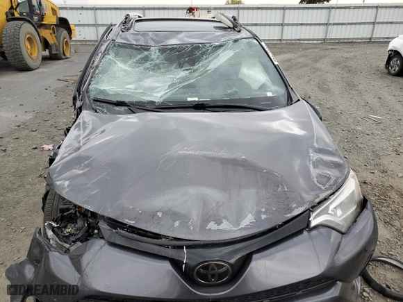 2016 Toyota RAV4 SE with VIN JTMJFREV9GJ088756, listed as a Copart auction lot 69210994 with 0 mi miles and Salvage Title. Bid and sale history available at carsss.com. Image 12.
