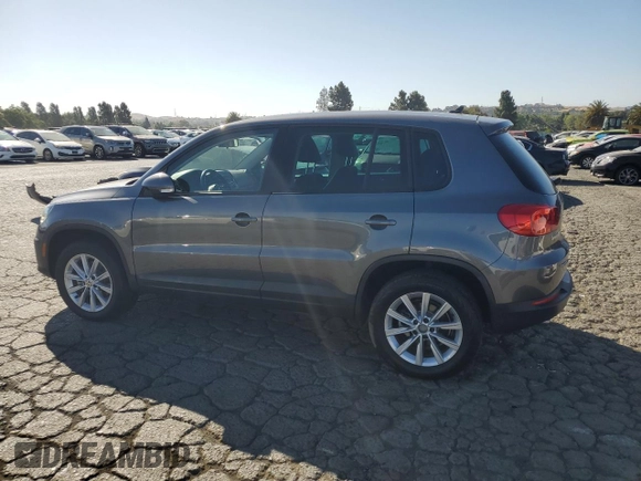2014 Volkswagen Tiguan SEL with VIN WVGAV3AX8EW585929, listed as a Copart auction lot 61462205 with 63,899 mi miles and Salvage title. Bid and sale history available at DreamBid. Image 2.