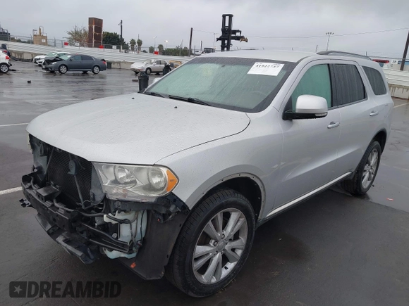 2013 Dodge Durango Crew z VIN 1C4RDJDGXDC637572, wystawiony jako IAAI lot #41922757 z przebiegiem 110 941 mil mil oraz . Historia ofert i sprzedaży dostępna na DreamBid. Obrazek 19.