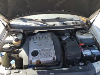 2004 Kia Sedona LX with VIN KNDUP131046585706, listed as a Copart auction lot 74973304 with 107,130 mi miles and Salvage Title. Bid and sale history available at carsss.com. Image 12.