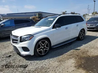 2017 Mercedes-Benz GLS with VIN 4JGDF7DE1HA873126, listed as a Copart auction lot 50594275 with 77,275 mi miles and Salvage Title. Bid and sale history available at carsss.com. Image 1.