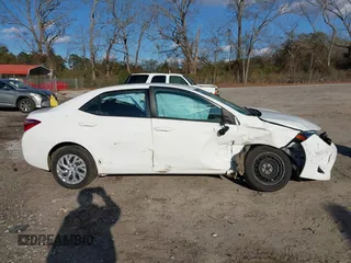 2019 Toyota Corolla L with VIN 5YFBURHEXKP934032, listed as a IAAI auction lot 41247557 with 95,560 mi miles. Bid and sale history available at carsss.com. Image 14.