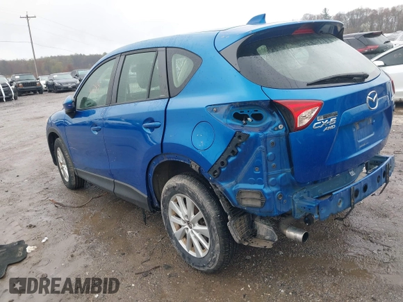 2014 Mazda CX-5 Sport with VIN JM3KE4BE6E0336504, listed as a IAAI auction lot 41961244 with 125,150 mi miles. Bid and sale history available at carsss.com. Image 3.