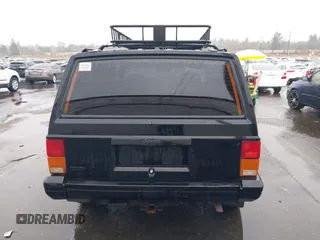 1996 Jeep Cherokee SE with VIN 1J4FJ28S9TL135564, listed as a IAAI auction lot 41618367 with 249,410 mi miles and . Bid and sale history available at DreamBid. Image 16.
