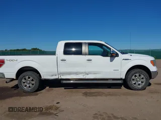 2011 Ford F-150 XLT z VIN 1FTFW1ET2BFC65701, wystawiony jako IAAI lot #42598794 z przebiegiem 209 676 mil mil oraz . Historia ofert i sprzedaży dostępna na DreamBid. Obrazek 13.