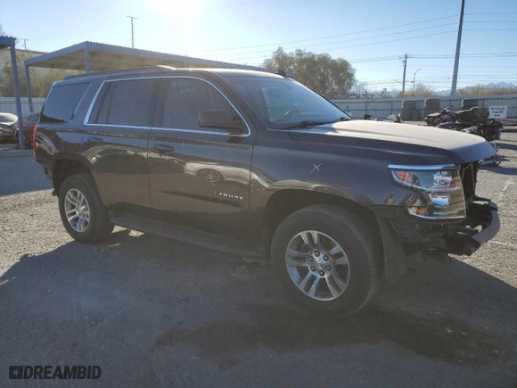 2017 Chevrolet Tahoe LS with VIN 1GNSCAKCXHR355107, listed as a Copart auction lot 87479794 with 121,880 mi miles and Salvage Title. Bid and sale history available at carsss.com. Image 4.