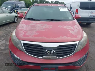 2012 Kia Sportage LX z VIN KNDPBCA23C7252797, wystawiony jako IAAI lot #42354421 z przebiegiem 224 451 mil mil oraz . Historia ofert i sprzedaży dostępna na DreamBid. Obrazek 6.