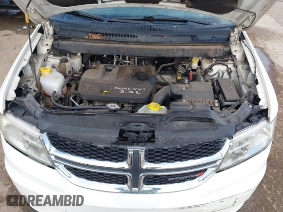 2014 Dodge Journey American Value with VIN 3C4PDCAB1ET209973, listed as a IAAI auction lot 41803864 with 168,774 mi miles and . Bid and sale history available at DreamBid. Image 10.