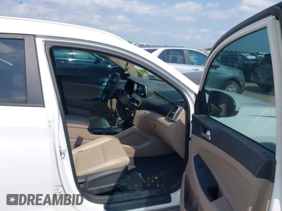 2019 Hyundai Tucson Sport with VIN KM8J33AL1KU861698, listed as a IAAI auction lot 42129173 with 100,160 mi miles. Bid and sale history available at carsss.com. Image 5.