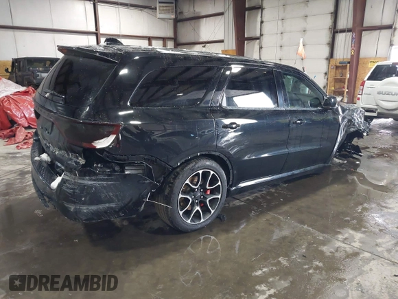 2023 Dodge Durango SRT Hellcat Premium z VIN 1C4SDJH90PC596225, wystawiony jako IAAI lot #41600943 z przebiegiem 18 877 mil mil oraz . Historia ofert i sprzedaży dostępna na DreamBid. Obrazek 4.