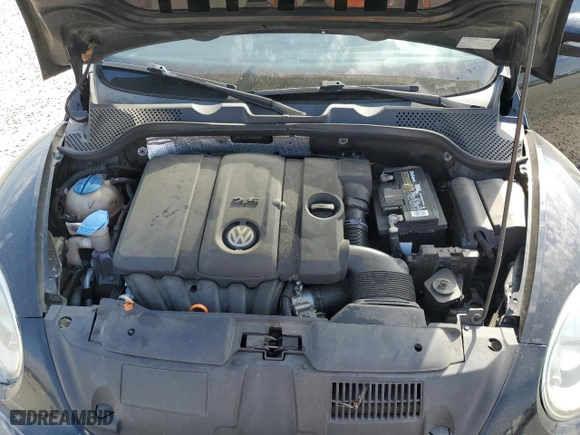 2013 Volkswagen Beetle Coupe 2.5L with VIN 3VWJP7AT8DM664287, listed as a Copart auction lot 46989865 with 124,974 mi miles and Salvage Title. Bid and sale history available at carsss.com. Image 12.