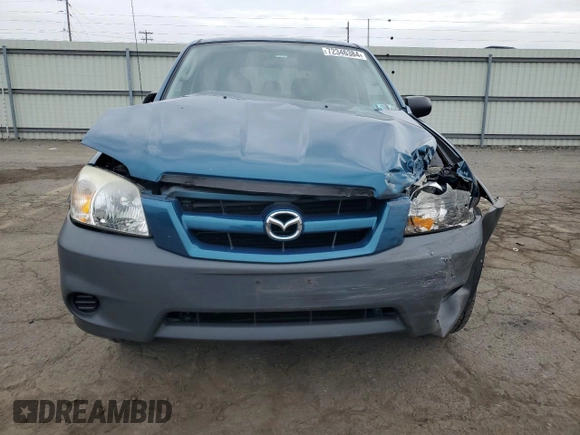 2005 Mazda Tribute i with VIN 4F2YZ02ZX5KM17738, listed as a Copart auction lot 72346384 with 203,245 mi miles and Salvage Title. Bid and sale history available at carsss.com. Image 5.