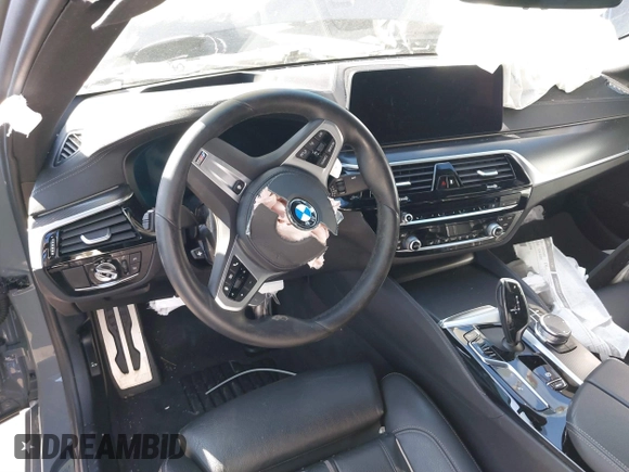 2022 BMW 5 Series M550i xDrive with VIN WBA13BK02NCJ61943, listed as a IAAI auction lot 41607980 with Not provided miles and . Bid and sale history available at DreamBid. Image 21.