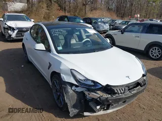 2021 Tesla Model 3 Long Range with VIN 5YJ3E1EB2MF858267, listed as a IAAI auction lot 41782360 with 79,671 mi miles and . Bid and sale history available at DreamBid. Image 6.