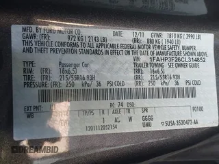 2012 Ford Focus SE with VIN 1FAHP3F26CL314852, listed as a IAAI auction lot 42162488 with 101,782 mi miles. Bid and sale history available at carsss.com. Image 9.