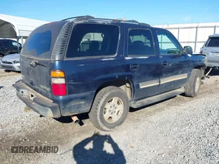 2005 Chevrolet Tahoe LT z VIN 1GNEC13T85J201856, wystawiony jako IAAI lot #41099372 z przebiegiem 303 169 mil mil oraz . Historia ofert i sprzedaży dostępna na DreamBid. Obrazek 4.