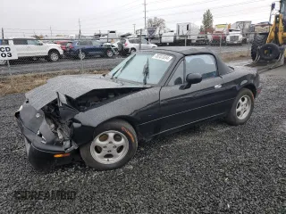 1994 Mazda MX-5 Miata with VIN JM1NA3537R0506865, listed as a Copart auction lot 78707654 with 176,415 mi miles and Salvage title. Bid and sale history available at DreamBid. Image 1.
