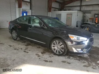 2014 Kia Cadenza Premium with VIN KNALN4D79E5156140, listed as a Copart auction lot 69282604 with 127,626 mi miles and Clean Title. Bid and sale history available at carsss.com. Image 4.