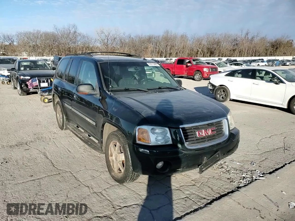 2004 GMC Envoy SLE with VIN 1GKDT13S142197514, listed as a Copart auction lot 89014465 with 202,790 mi miles and Salvage Title. Bid and sale history available at carsss.com. Image 12.