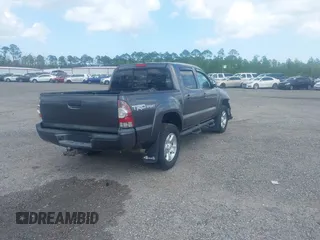 2014 Toyota Tacoma with VIN 5TFLU4EN9EX099414, listed as a IAAI auction lot 40528514 with 122,827 mi miles. Bid and sale history available at carsss.com. Image 4.