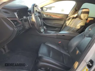 2016 Cadillac CTS RWD with VIN 1G6AP5SX4G0168857, listed as a Copart auction lot 52098715 with 184,364 mi miles and Salvage title. Bid and sale history available at DreamBid. Image 7.