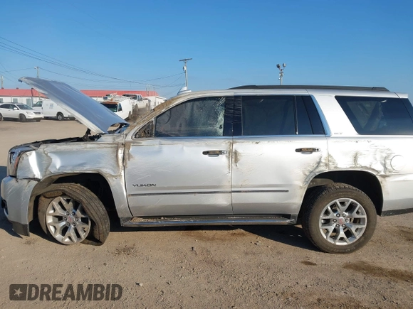2020 GMC Yukon SLT Standard Edition with VIN 1GKS2DKCXLR294027, listed as a IAAI auction lot 41004965 with 69,161 mi miles. Bid and sale history available at carsss.com. Image 6.