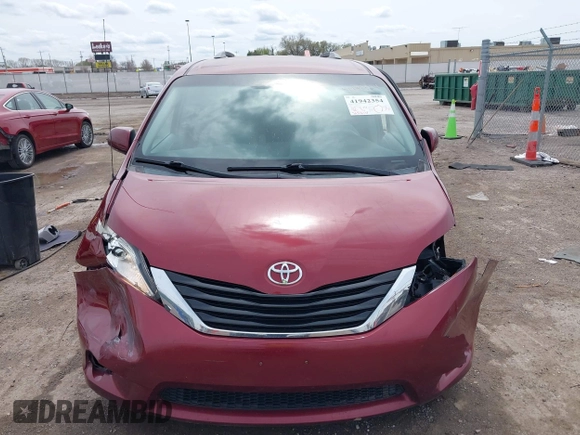 2014 Toyota Sienna LE AAS with VIN 5TDKK3DC4ES462090, listed as a IAAI auction lot 41942354 with 215,814 mi miles. Bid and sale history available at carsss.com. Image 12.