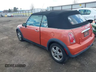 2006 MINI Convertible with VIN WMWRF33546TF65857, listed as a IAAI auction lot 41814032 with 91,736 mi miles and . Bid and sale history available at DreamBid. Image 3.