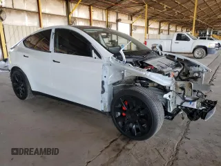 2021 Tesla Model Y Long Range z VIN 5YJYGDEE2MF243858, wystawiony jako Copart lot #58043055 z przebiegiem 24 128 mil mil oraz Szkoda całkowita • Salvage title. Historia ofert i sprzedaży dostępna na DreamBid. Obrazek 4.