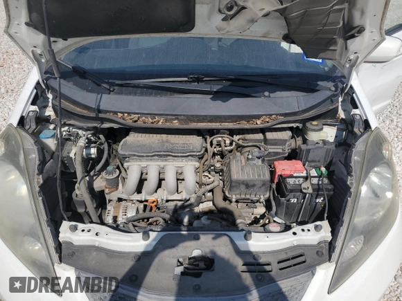 2012 Honda Fit с VIN JHMGE8H33CC030639, выставлен на аукционе Copart как лот 53114595 с пробегом 108 797 миль миль и Списание • Salvage title. История ставок и продаж доступна на DreamBid. Изображение 12.