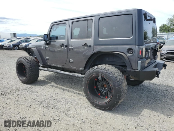 2016 Jeep Wrangler Unlimited Freedom with VIN 1C4BJWDG8GL300314, listed as a Copart auction lot 61044645 with 103,396 mi miles and Clean title. Bid and sale history available at DreamBid. Image 2.