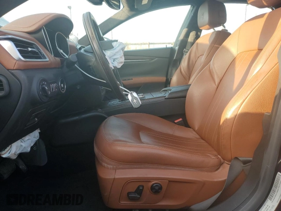 2018 Maserati Ghibli with VIN ZAM57XSA0J1286682, listed as a Copart auction lot 65457315 with 50,169 mi miles and Salvage title. Bid and sale history available at DreamBid. Image 7.